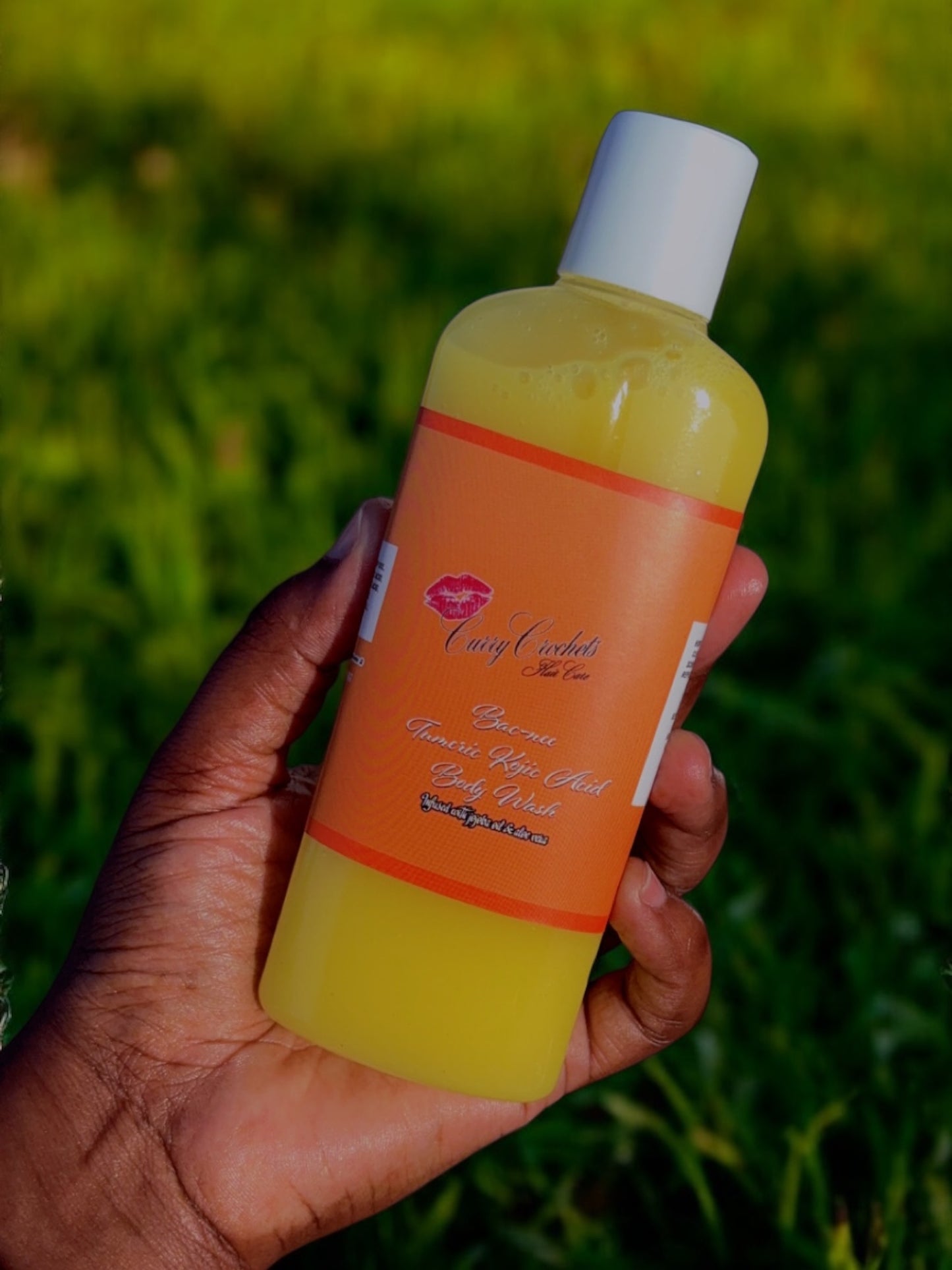 “Bac-Nee” Kojic Acid and Turmeric Body Wash with Jojoba oil and Aloe Vera for clearer skin.